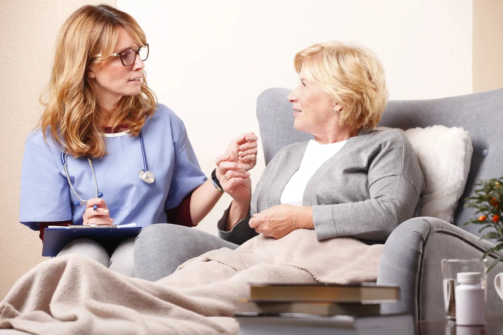 nurse helping woman at an assisted living in Chicago